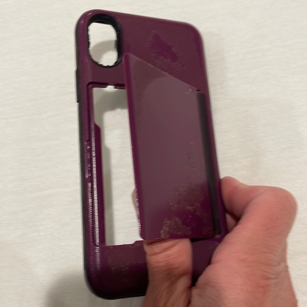 Incipio Stowaway IPhone X case with hidden credit card/license storage.
